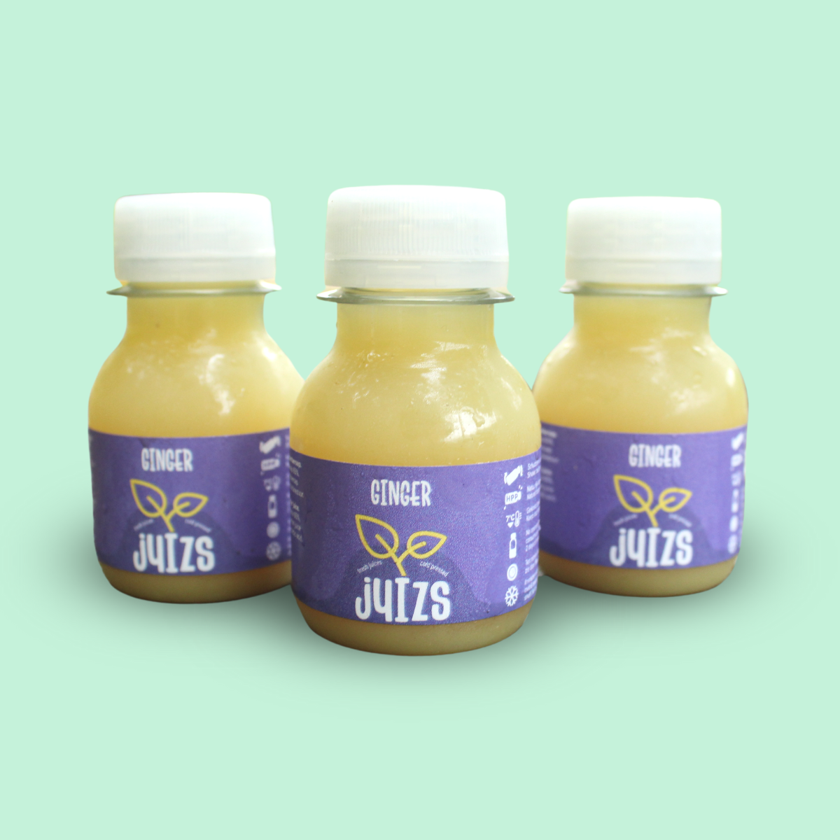 Drie flesjes gembershot van Juizs